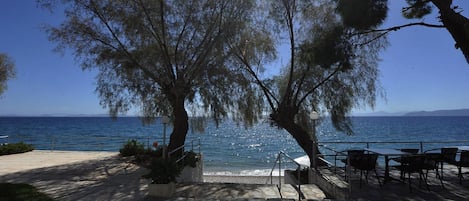 On the beach, sun loungers, beach umbrellas