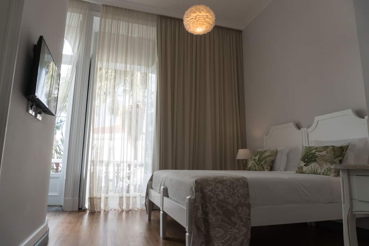 Superior kamer, 1 twee- of 2 eenpersoonsbedden | Badkamer | Een douche, gratis toiletartikelen, een haardroger, handdoeken