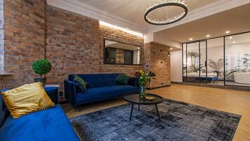 Deluxe Loft | Living area | TV