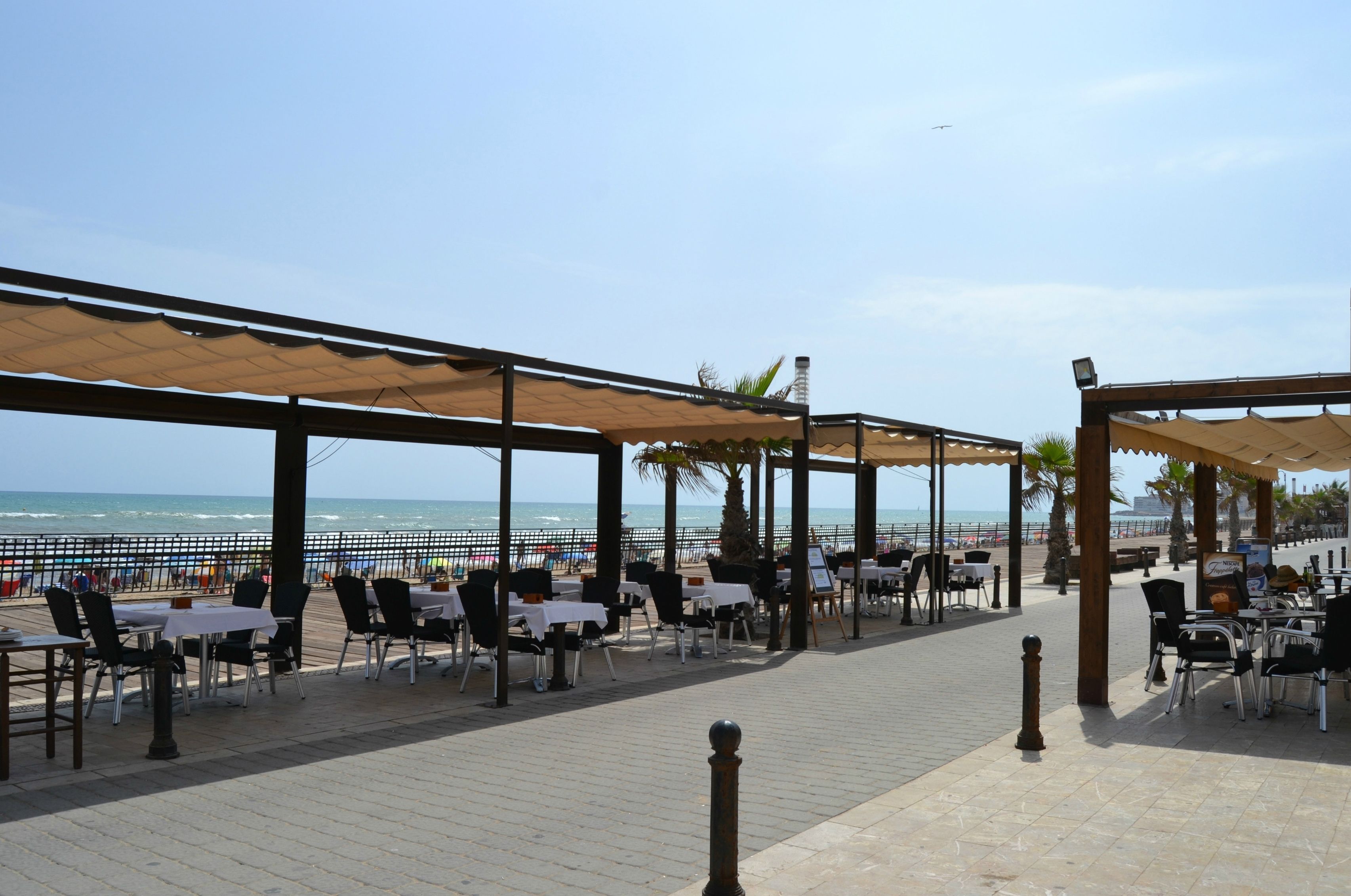 Breakfast, lunch served; Mediterranean cuisine, beach views 