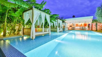 Outdoor pool, free pool cabanas, pool umbrellas