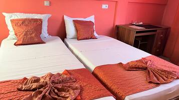 Twin Room | 1 bedroom, in-room safe, blackout curtains, iron/ironing board