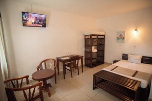 Basic Triple Room, Multiple Beds | In-room safe, desk, free WiFi, bed sheets