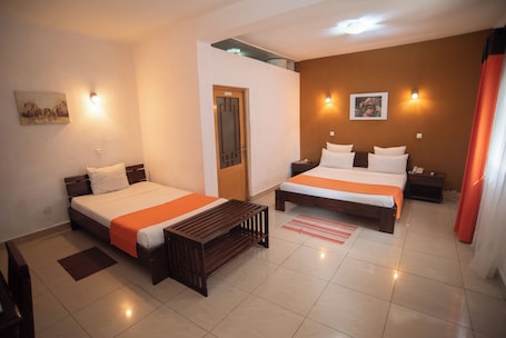 Basic Triple Room, Multiple Beds | In-room safe, desk, free WiFi, bed sheets. Hotel H1 Tamatave
