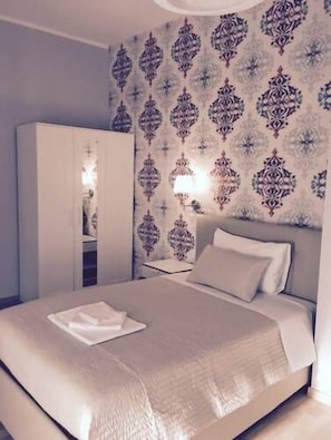 Comfort Quadruple Room | Free WiFi, bed sheets