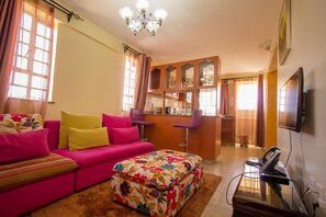Apartment, 1 Bedroom | Living area | Flat-screen TV - Ikonia Resort and Hotel (Kisumu)