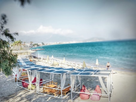 Private beach, sun loungers, beach umbrellas, beach towels