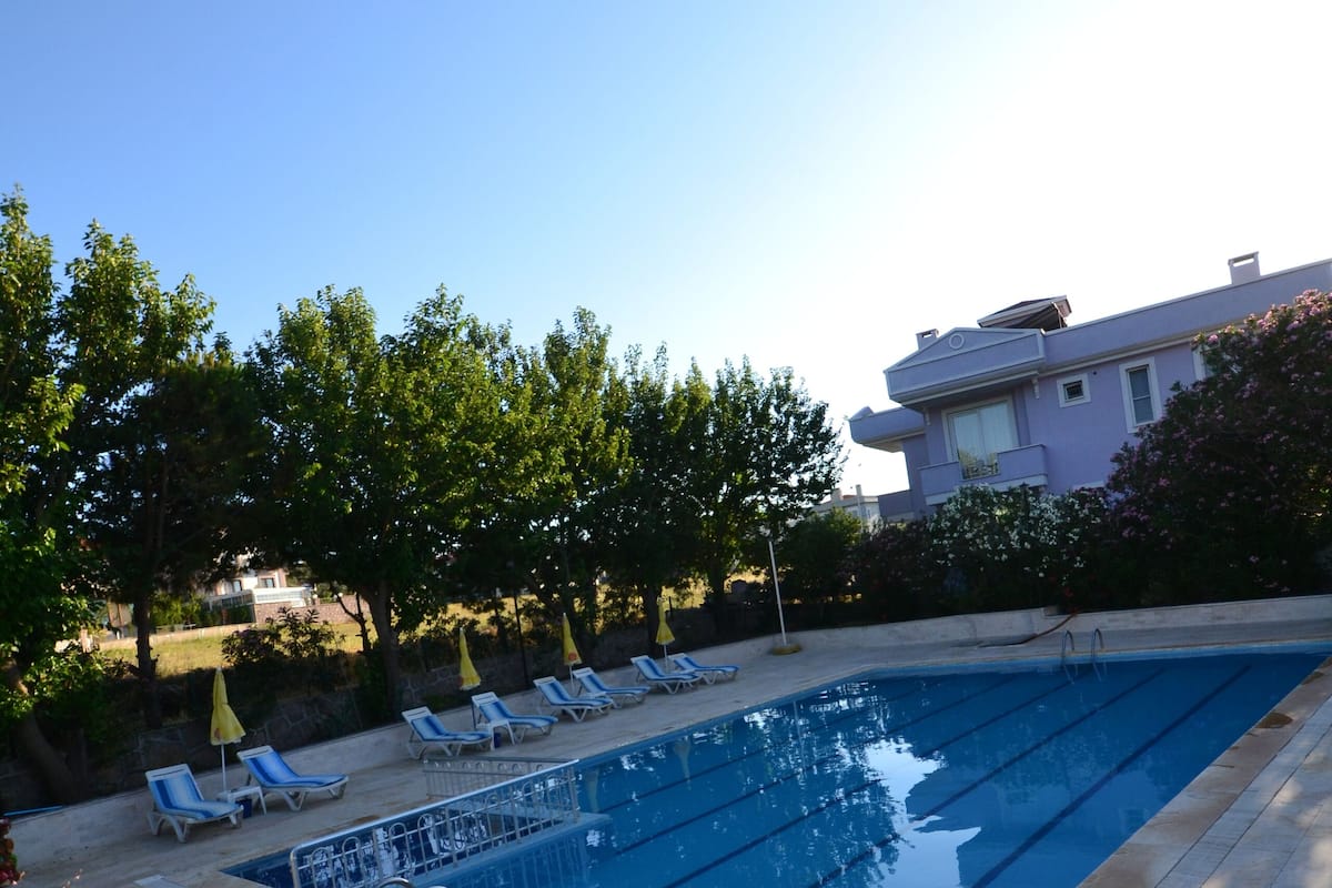 Standard Triple Room, Pool View | Minibar, in-room safe, iron/ironing board, free WiFi