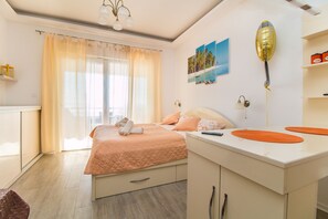 Deluxe Studio | Premium bedding, individually decorated, desk, iron/ironing board