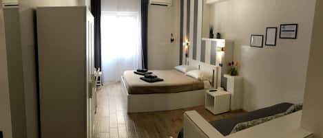 Luxury Triple Room, Multiple Beds, City View | Premium bedding, down duvets, memory-foam beds, minibar