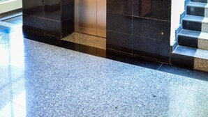 A modern elevator with a digital display, a glass door, and a control panel. - Lido Beach Resort (Mombasa)