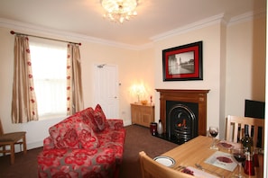 Luxury Apartment, 1 Bedroom | Living room | 32-inch flat-screen TV with satellite channels, Smart TV, fireplace - Conway Cottages (York)