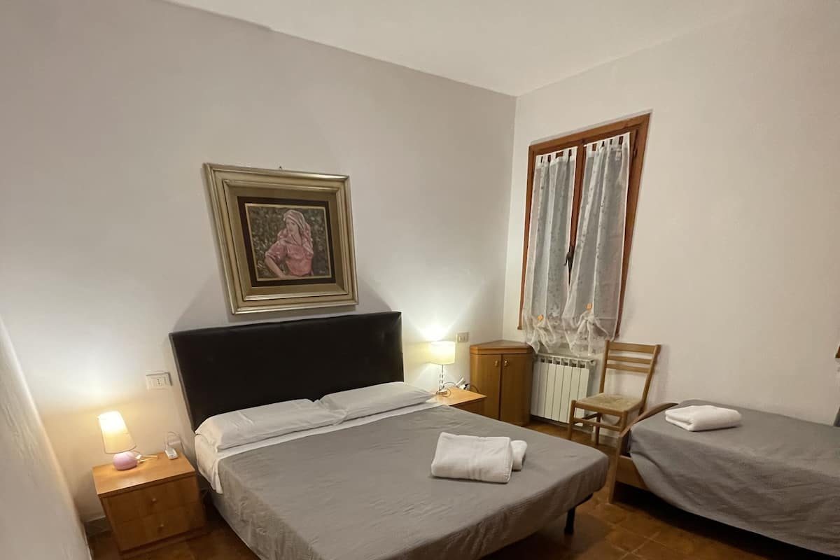 City Triple Room, Shared Bathroom, City View | 2 bedrooms, premium bedding, blackout drapes, soundproofing
