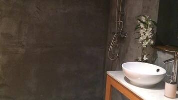 Deluxe Room, Jetted Tub | Bathroom sink