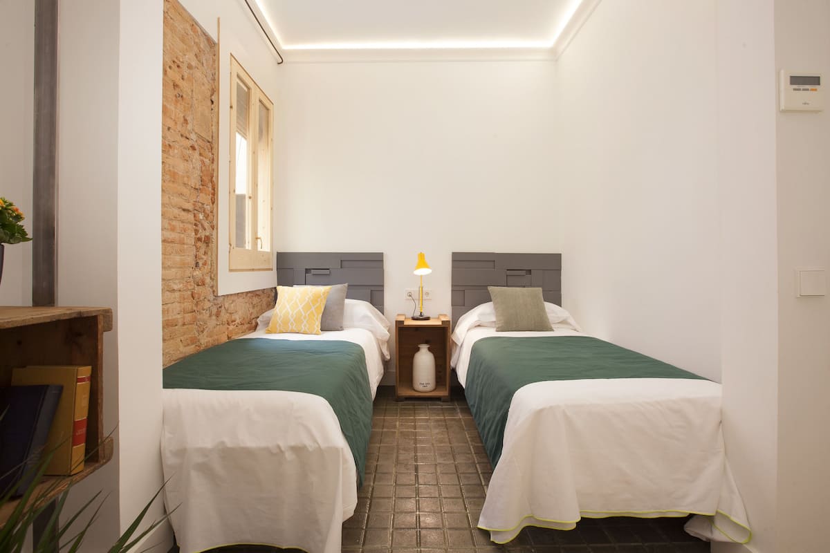 Comfort Twin Room | Down duvets, memory-foam beds, in-room safe, individually decorated
