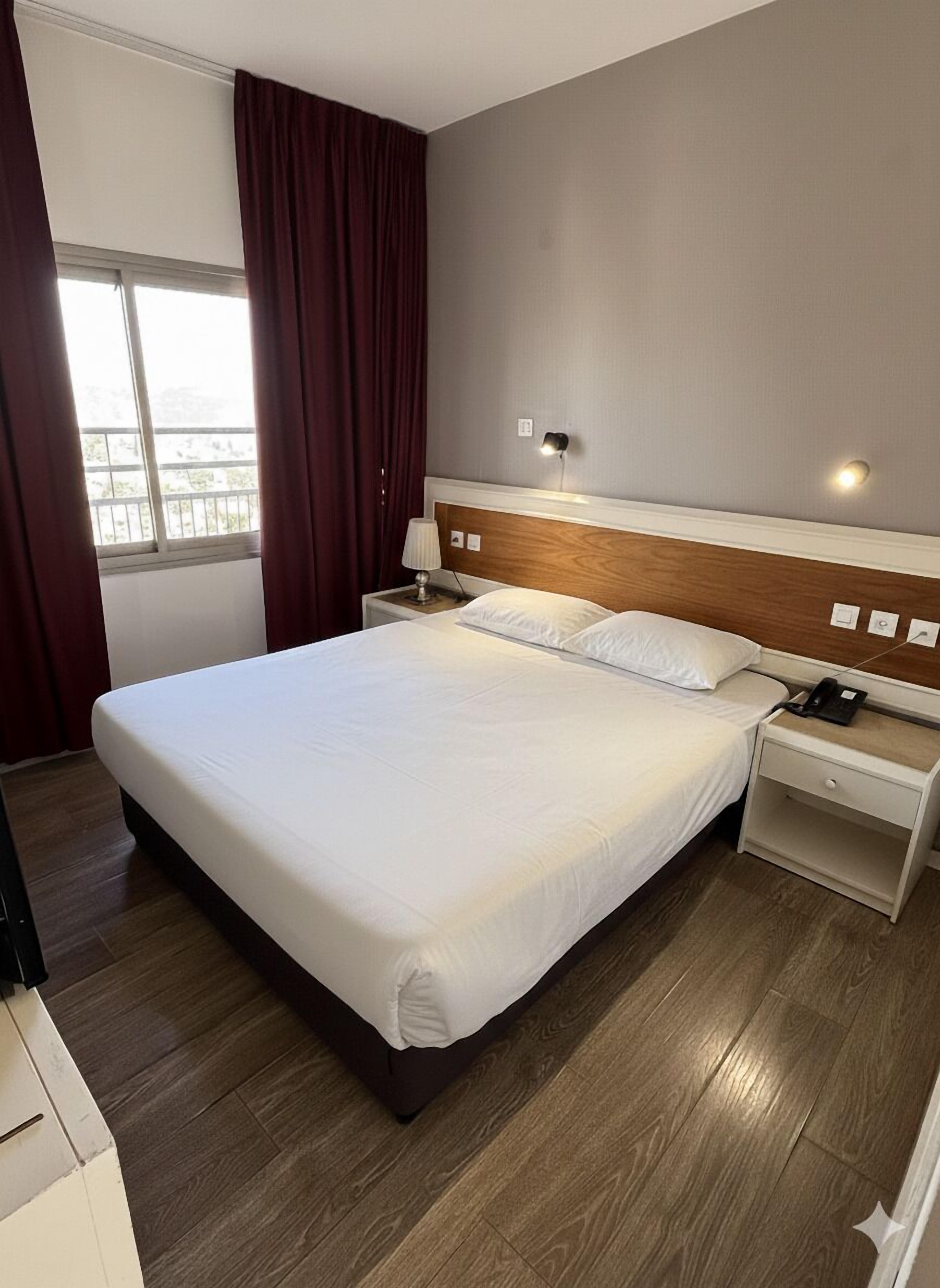 Desk, free WiFi, bed sheets