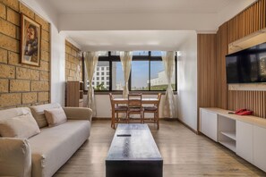 Deluxe Suite, 1 Bedroom | Living area | TV - Kates Apartments (Nairobi)