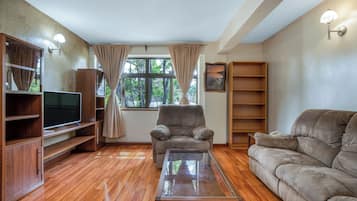 Superior Apartment, 1 Bedroom | Minibar, in-room safe, desk, laptop workspace