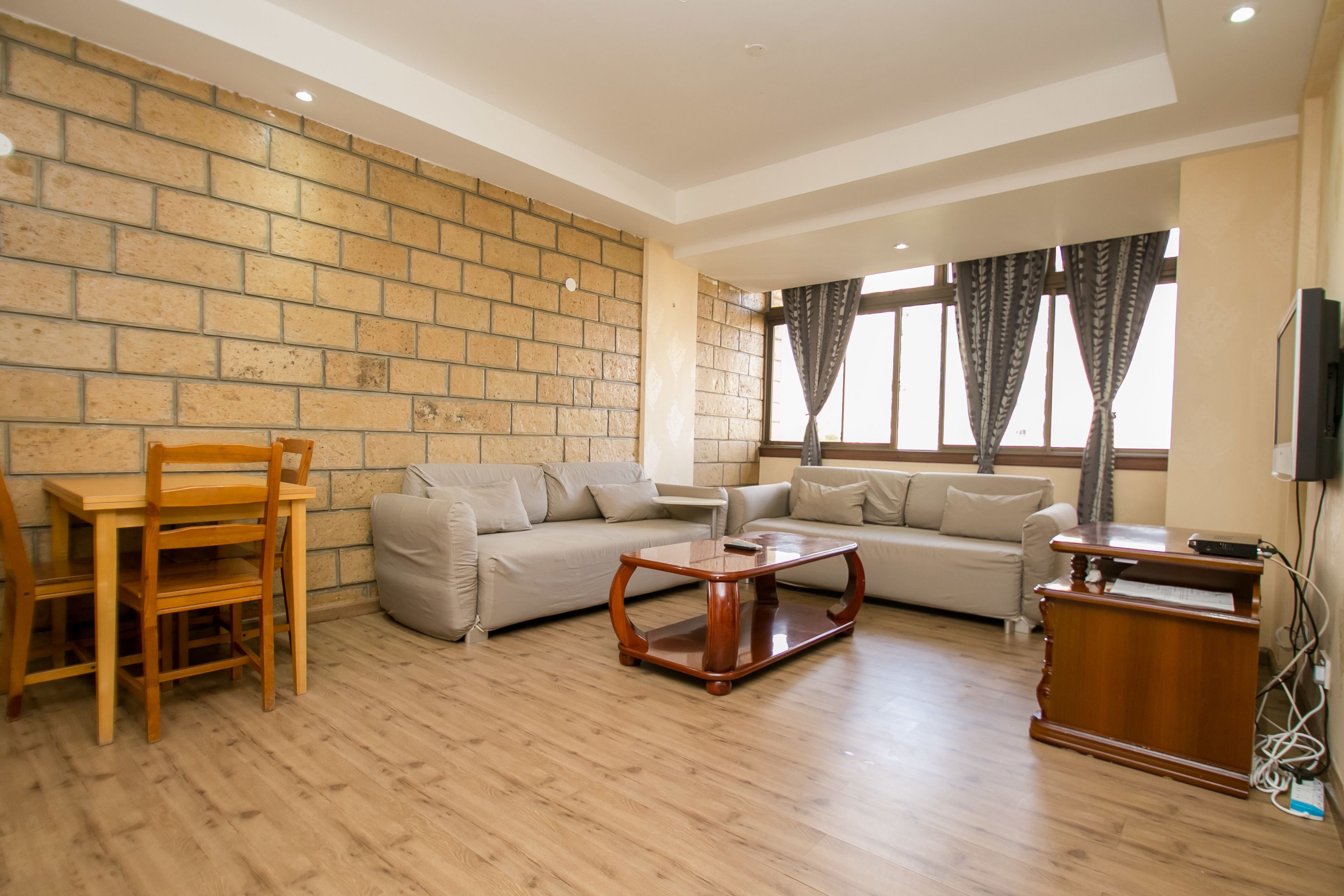 Standard Apartment, 1 Bedroom | Living area | TV