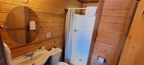 Cabin, 1 Queen Bed (Kozy Cabin) | Bathroom | Shower, free toiletries, towels, soap