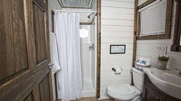 Deluxe Suite, 2 Queen Beds | Bathroom | Shower, free toiletries, towels, soap