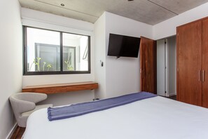 Deluxe Apartment, 2 Bedrooms, Kitchen, City View | 2 bedrooms, in-room safe, desk, iron/ironing board