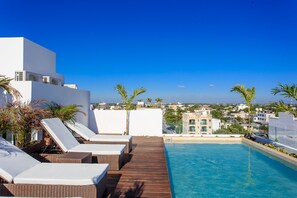 Outdoor pool, sun loungers