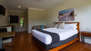 Desk, laptop workspace, blackout curtains, iron/ironing board