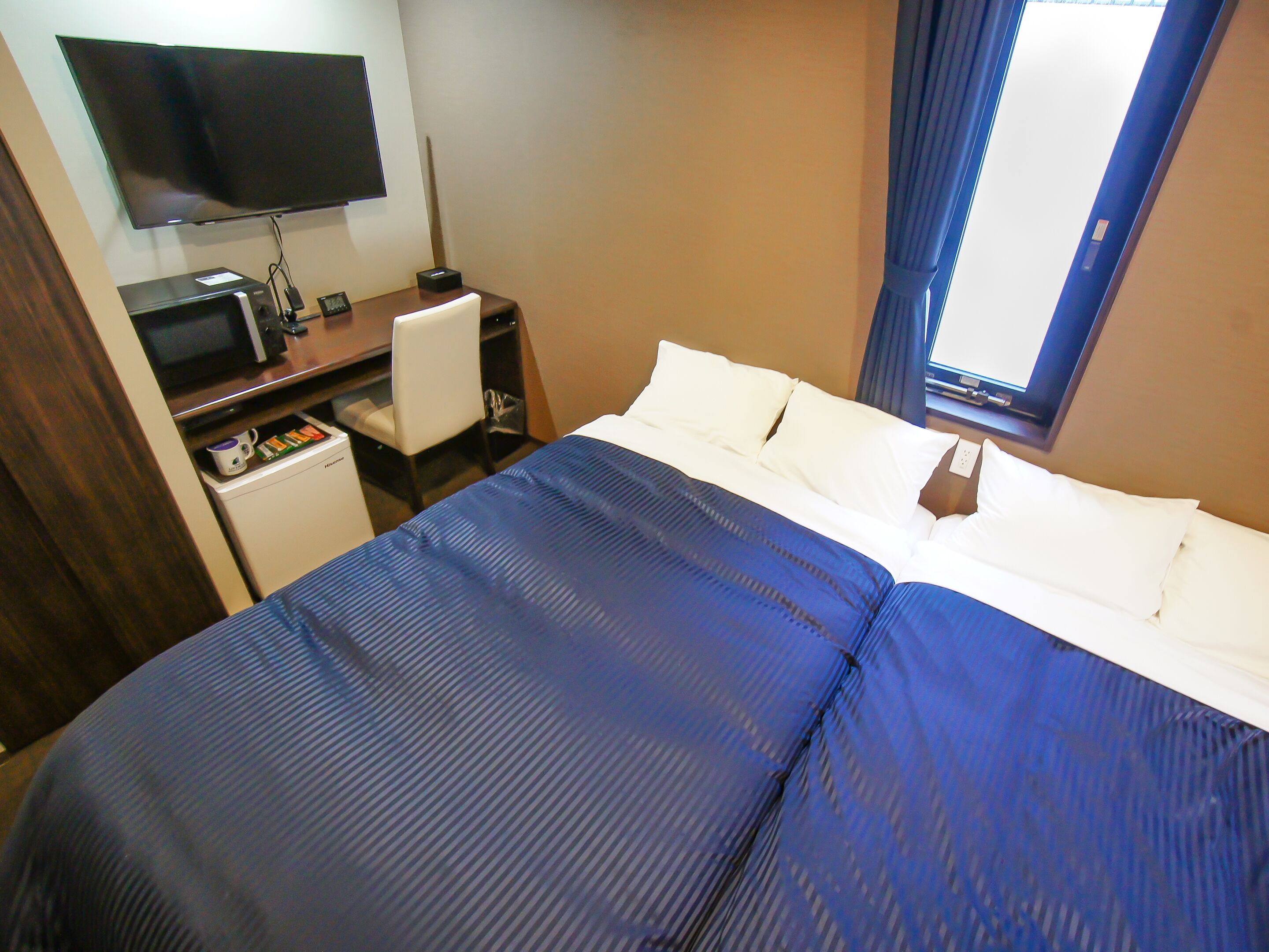 desk, blackout curtains, free wifi, bed sheets