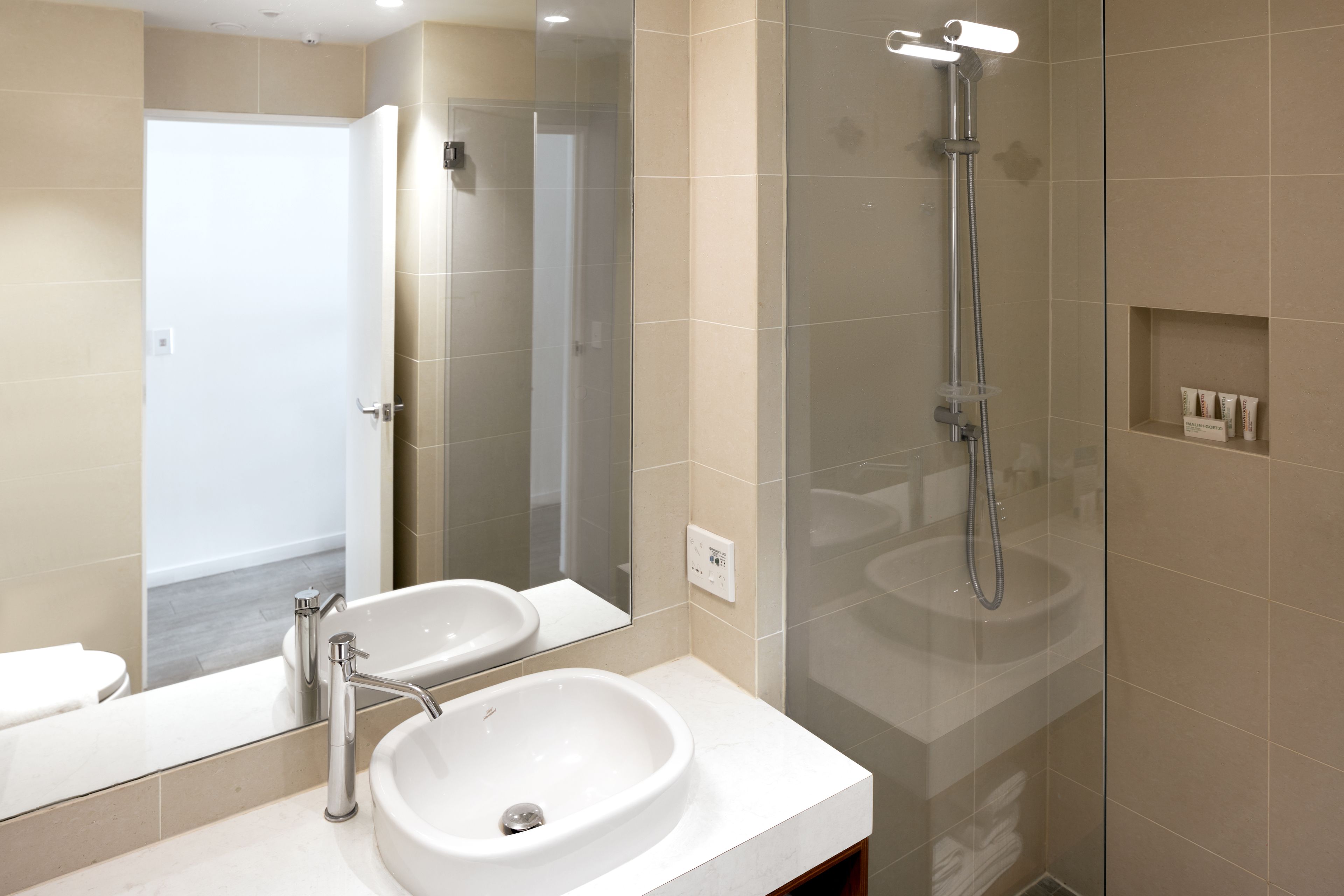 shower, rainfall showerhead, designer toiletries, hair dryer