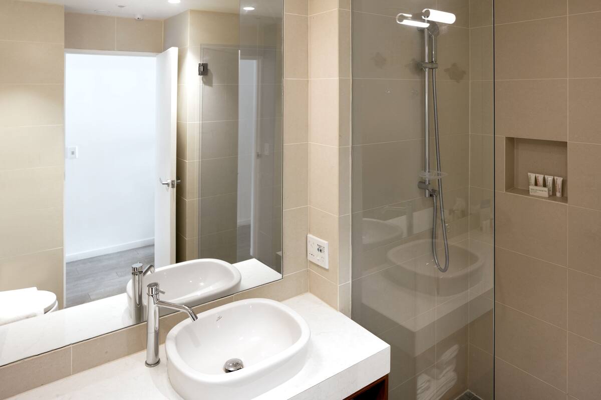 shower, rainfall showerhead, designer toiletries, hair dryer