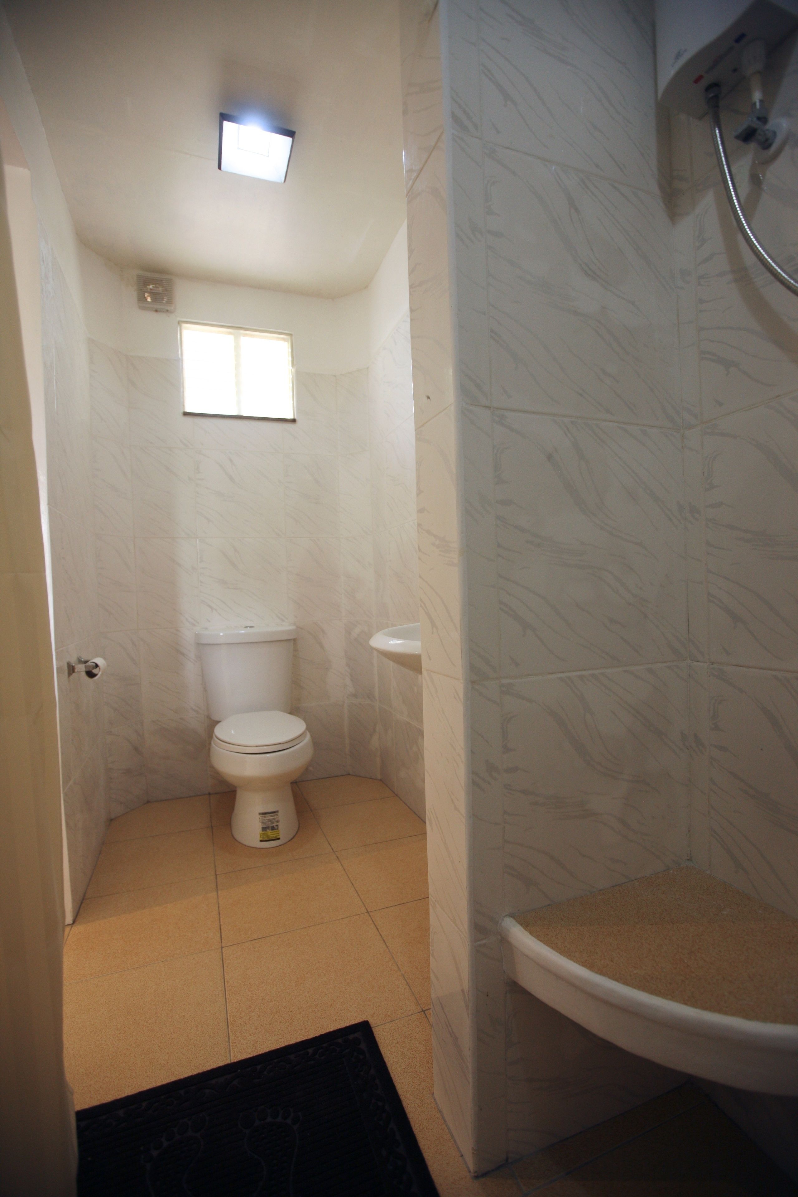 shower, free toiletries, slippers, towels