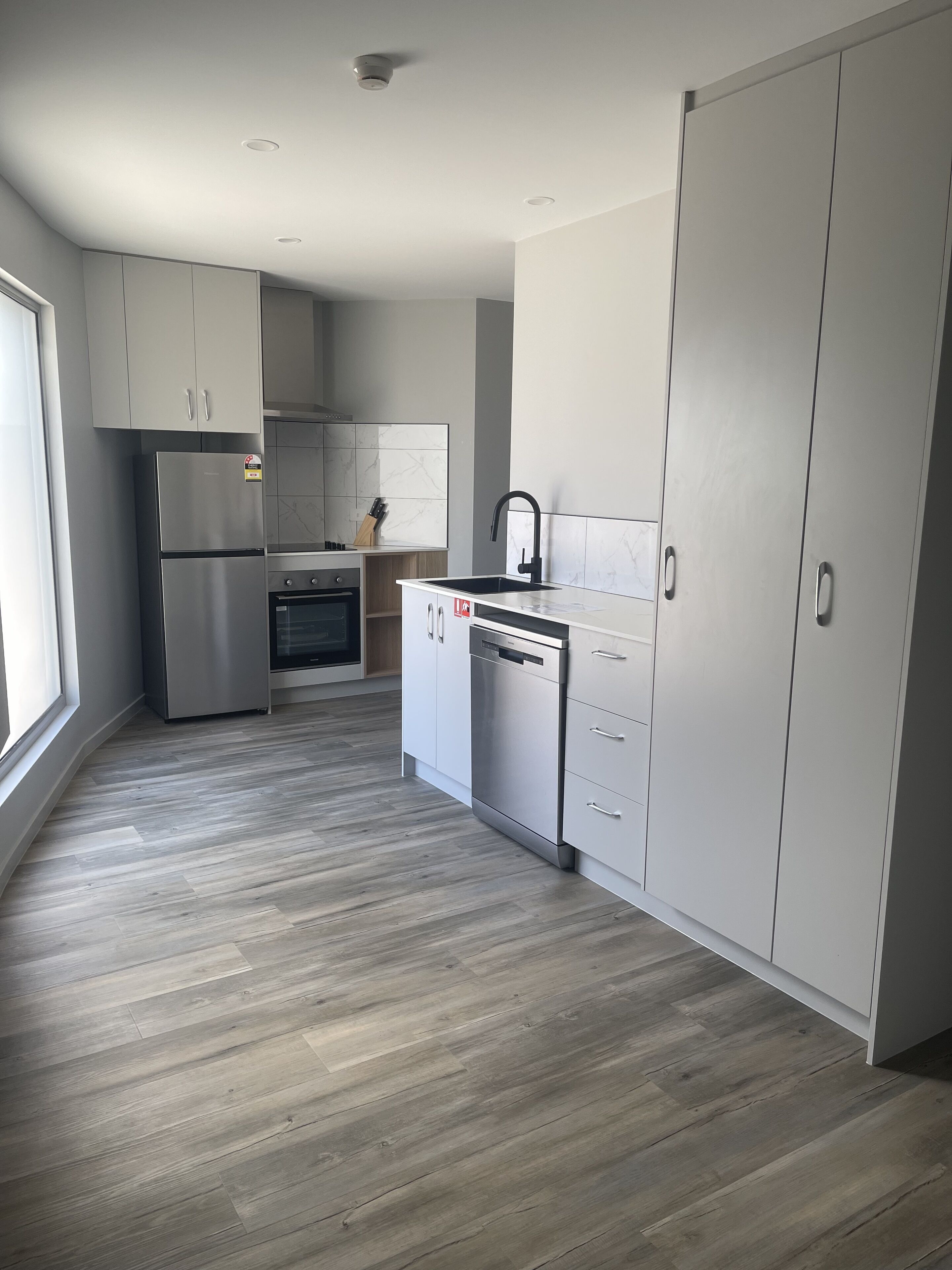 luxury studio | private kitchen | full-sized fridge, microwave, oven, stovetop