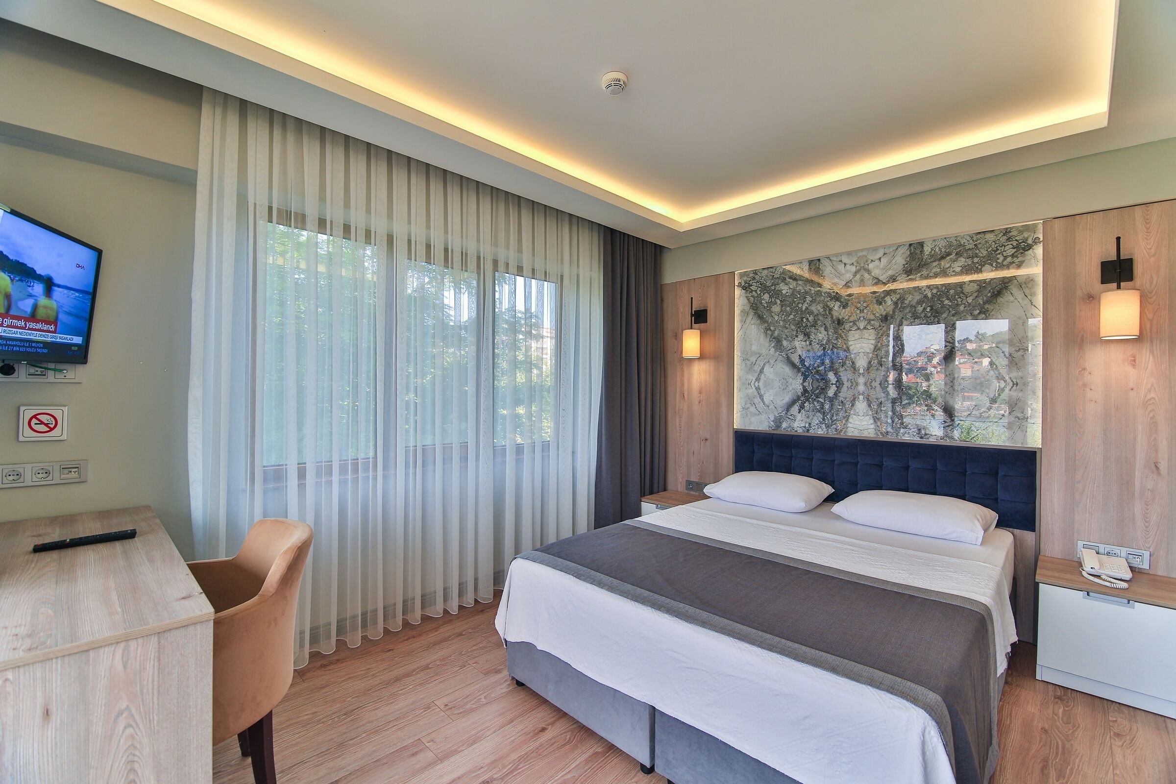 Deluxe Double Room, Sea View | Premium bedding, minibar, desk, laptop workspace