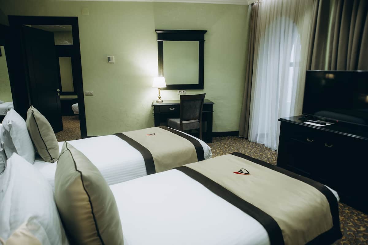 Family Room, 2 Twin Beds, Connecting Rooms, Sea View | Living area | LED TV