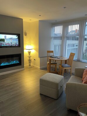 Fer et planche à repasser, draps fournis