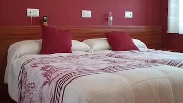 Down duvets, memory-foam beds, in-room safe, desk