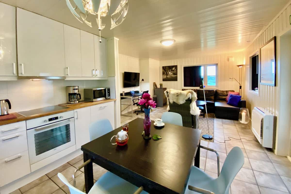 Apartment, 2 Bedrooms (D/E) | Living area | Smart TV, pay movies, heated floors, streaming services