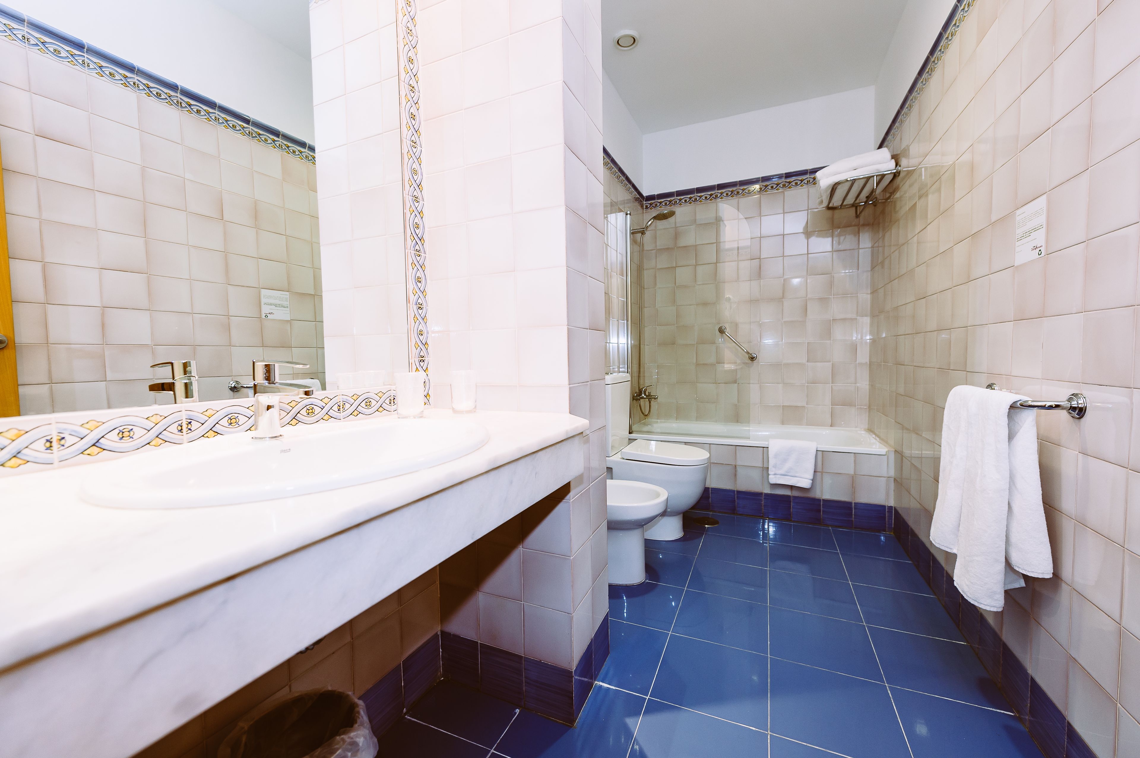 free toiletries, hair dryer, bidet, towels