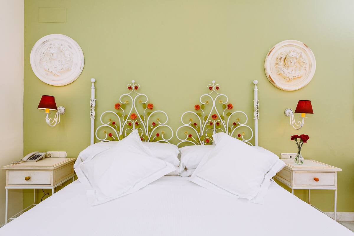 Premium bedding, in-room safe, desk, iron/ironing board (on request)