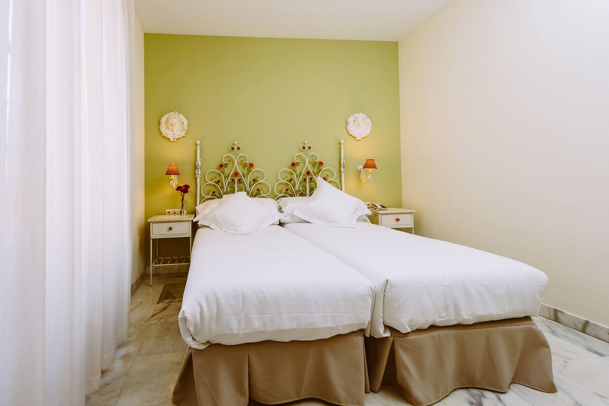 Premium bedding, in-room safe, desk, iron/ironing board (on request)