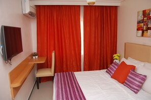 Deluxe-Einzelzimmer, eigenes Bad | Hochwertige Bettwaren, Zimmersafe, Schreibtisch, kostenloses WLAN