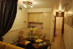 Apartment, 1 Bedroom | Living area | Flat-screen TV