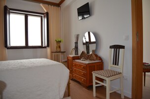 Sistema de insonorización y tabla de planchar con plancha 