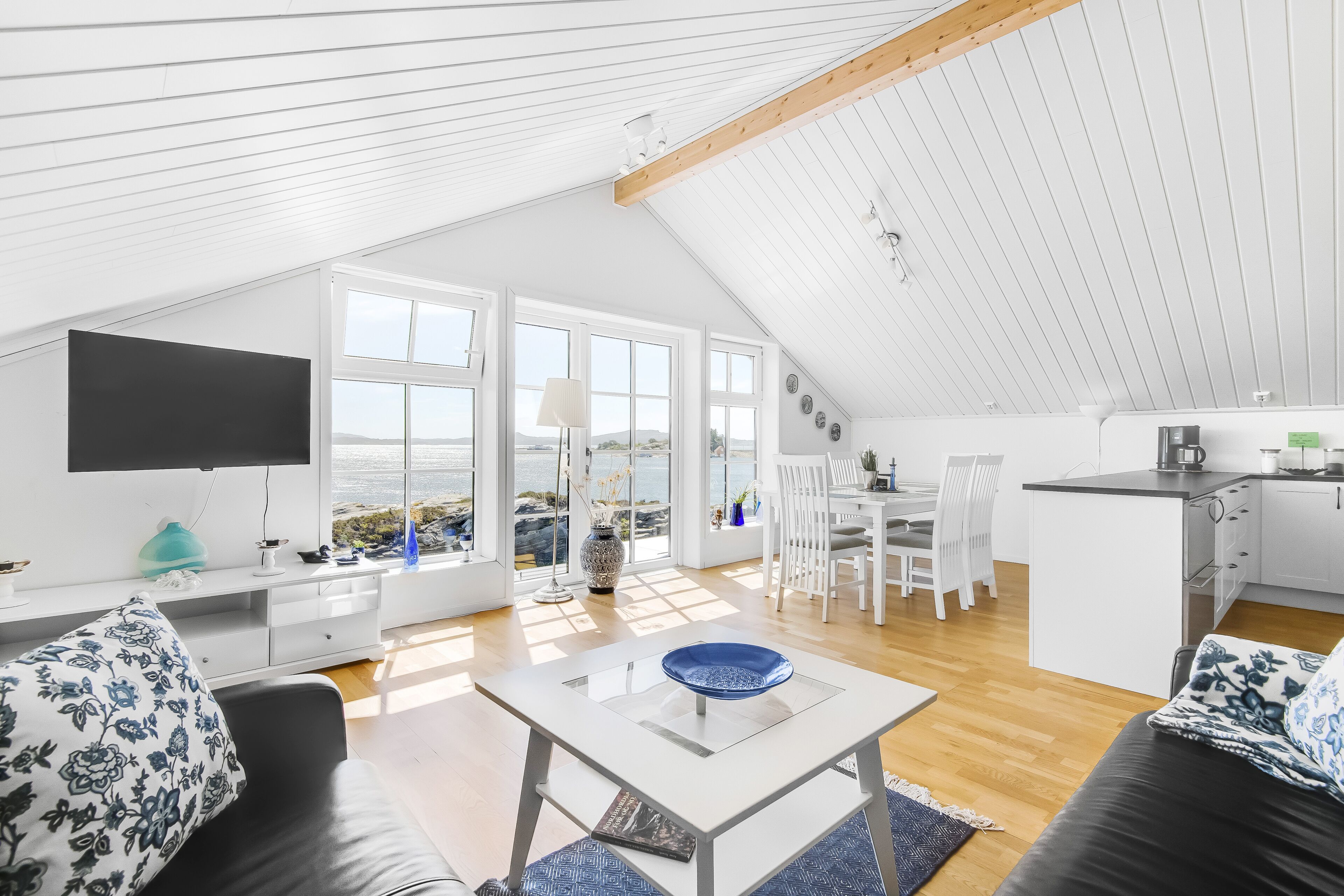 Panoramic Apartment, 4 Bedrooms | Living area | 42-inch TV with cable channels