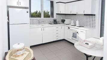Panoramic Villa, 3 Bedrooms | Private kitchen | Fridge, oven, stovetop, coffee/tea maker