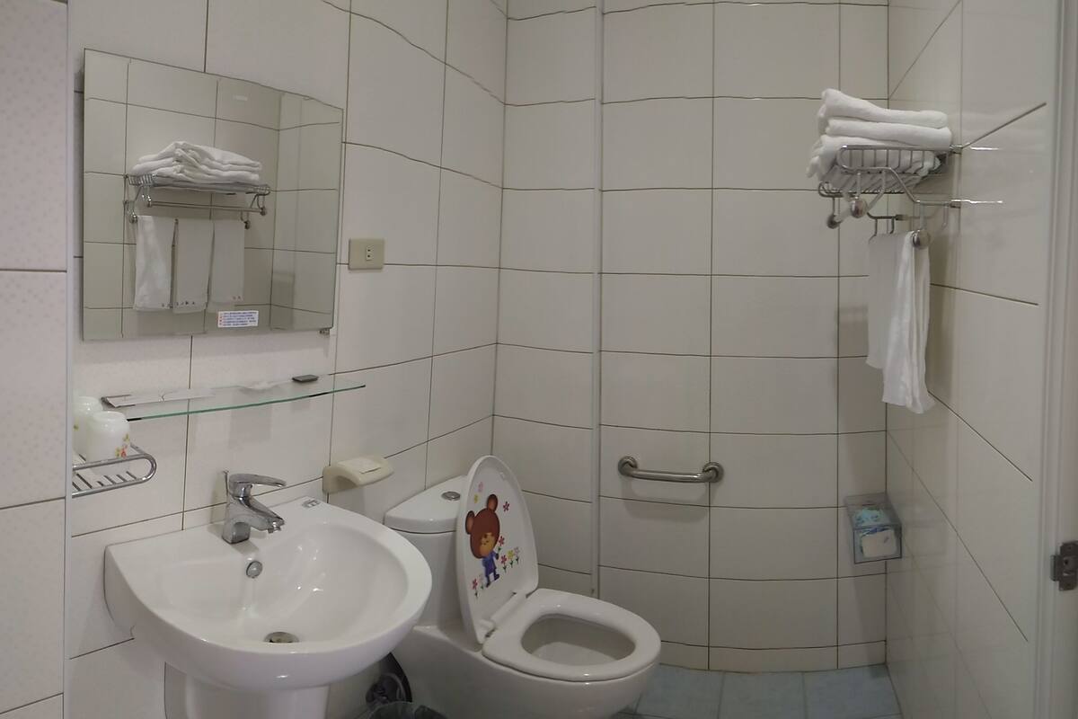 Basic Quadruple Room, 1 Bedroom, Accessible | Bathroom | Shower, free toiletries, hair dryer, slippers