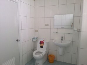 Economy Quadruple Room, 2 Bedrooms | Bathroom | Shower, free toiletries, hair dryer, slippers - Blockhead Bed and Breakfast (Taitung)