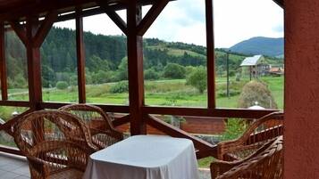 Breakfast, lunch served; local and international cuisine, pool views