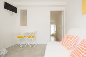 Twin kamer, 1 slaapkamer | Woonkamer | Flatscreentelevisie